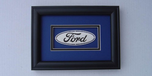 Show off how much you love Ford with this shadowbox will make the perfect addition to a garage or office wall.