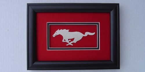 Show off how much you love the Ford mustang with this shadowbox will make the perfect addition to a garage or office wall.