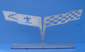 This 1980-81 Crossed Flags Desktop Model will offer a great accent to an office, garage, or dealership. It's the perfect gift for that hard to shop for guy or gal and is constructed of stainless steal.