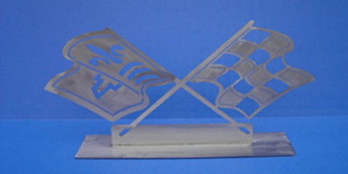 This 1967-76 Crossed Flags Wall Hanging will offer a great accent to an office, garage, or dealership. It's the perfect gift for that hard to shop for guy or gal and is constructed of stainless steal.