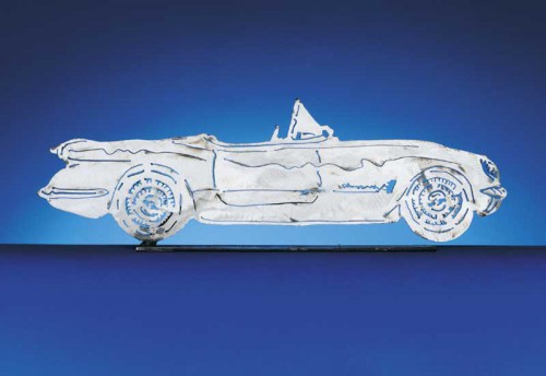 Each CarArtWork Corvette sculpture is 17 inches long and is mounted on a flat metal base. The sculpture is securely attached to the base with a single metal rod affixed to the rear of the piece. The mounting rod is positioned so that its appearance is minimized from the front view of the sculpture. Each piece has a brushed metal finish and is coated with clear lacquer to preserve its luster.