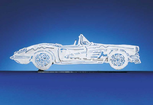 Introducing the 1958-1960 C1 Corvette Convertible. Each CarArtWork Corvette sculpture is 17 inches long and is mounted on a flat metal base. The sculpture is securely attached to the base with a single metal rod affixed to the rear of the piece. The mounting rod is positioned so that its appearance is minimized from the front view of the sculpture. Each piece has a brushed metal finish and is coated with clear lacquer to preserve its luster.